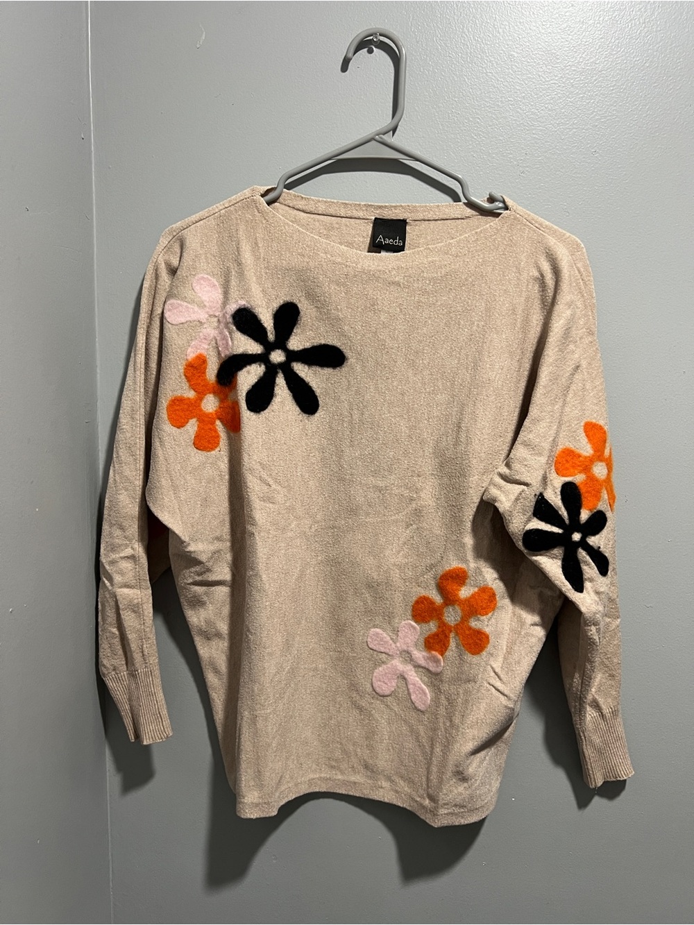 Aaeda Beige Sweater with Pink Orange and Black Flower Appliqués